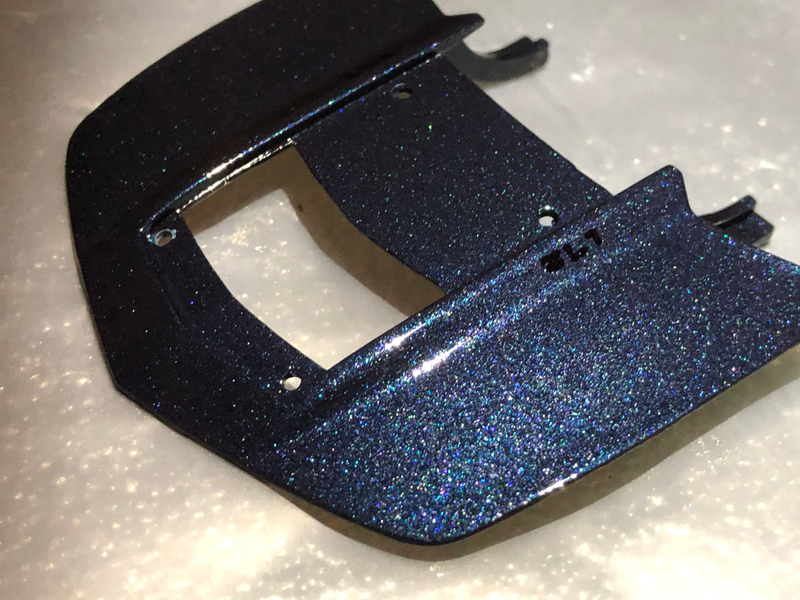 I added some custom touches to mimic his real ZL1 mods, like the black ZL1 hood badges seen here.